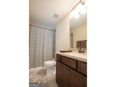 Discover easy living in this beautifully designed four bedroom on Lanier Island Legacy Golf Couorse in Georgia - for sale on GolfHomes.com, golf home, golf lot
