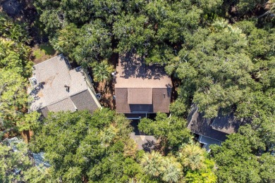 Nestled beneath the island's moss-draped live oaks and palms on The Seabrook Island Club in South Carolina - for sale on GolfHomes.com, golf home, golf lot