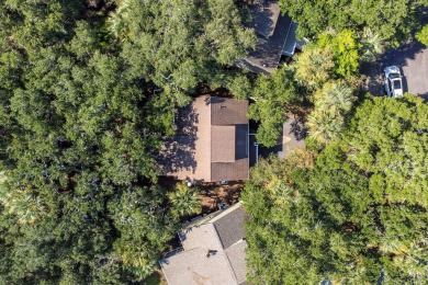Nestled beneath the island's moss-draped live oaks and palms on The Seabrook Island Club in South Carolina - for sale on GolfHomes.com, golf home, golf lot
