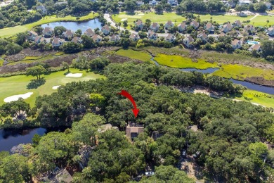 Nestled beneath the island's moss-draped live oaks and palms on The Seabrook Island Club in South Carolina - for sale on GolfHomes.com, golf home, golf lot