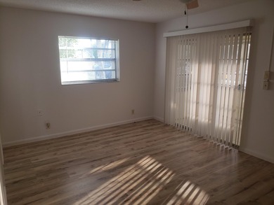 1st Floor Move in Ready Condo with Glass Enclosed Florida Room on Kings Point Golf -Flanders Way in Florida - for sale on GolfHomes.com, golf home, golf lot