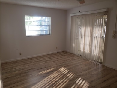 1st Floor Move in Ready Condo with Glass Enclosed Florida Room on Kings Point Golf -Flanders Way in Florida - for sale on GolfHomes.com, golf home, golf lot