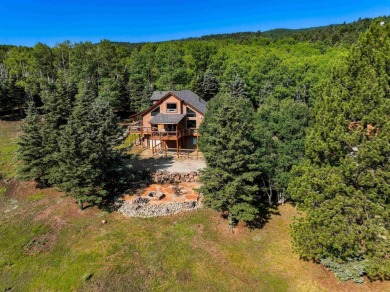 Located just off Hole #4 at the Angel Fire Resort Golf Course, 4 on Angel Fire Resort Country Club in New Mexico - for sale on GolfHomes.com, golf home, golf lot
