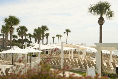 Nestled beneath the island's moss-draped live oaks and palms on The Seabrook Island Club in South Carolina - for sale on GolfHomes.com, golf home, golf lot