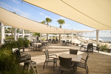 Nestled beneath the island's moss-draped live oaks and palms on The Seabrook Island Club in South Carolina - for sale on GolfHomes.com, golf home, golf lot