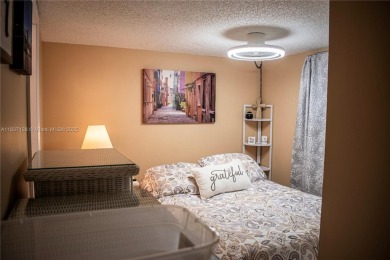 Welcome to your dream home in the vibrant 55+ community of on Wynmoor Golf Course in Florida - for sale on GolfHomes.com, golf home, golf lot