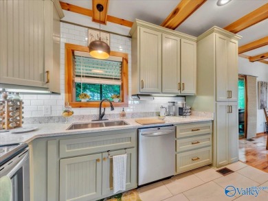 Stunning 3-bed/2-bath home offering privacy on 6.20 acres on Scottsboro Golf and Country Club in Alabama - for sale on GolfHomes.com, golf home, golf lot