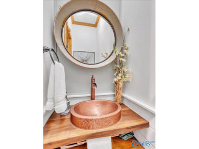 Stunning 3-bed/2-bath home offering privacy on 6.20 acres on Scottsboro Golf and Country Club in Alabama - for sale on GolfHomes.com, golf home, golf lot