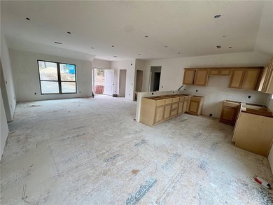 Live where adventure & comfort meet at 4 Dinton Lane in Bella on Bella Vista - Metfield Golf Complex and Country Club in Arkansas - for sale on GolfHomes.com, golf home, golf lot