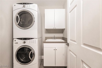 Discover this stunning first-floor coach home offering on Verandah Golf Course and Club in Florida - for sale on GolfHomes.com, golf home, golf lot