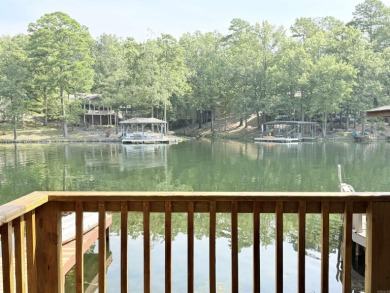 Discover lakeside living in this charming 2-bedroom, 1.5-bath on DeSoto Golf Course in Arkansas - for sale on GolfHomes.com, golf home, golf lot