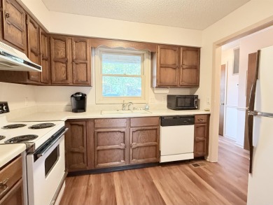 Discover lakeside living in this charming 2-bedroom, 1.5-bath on DeSoto Golf Course in Arkansas - for sale on GolfHomes.com, golf home, golf lot