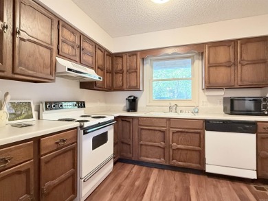 Discover lakeside living in this charming 2-bedroom, 1.5-bath on DeSoto Golf Course in Arkansas - for sale on GolfHomes.com, golf home, golf lot