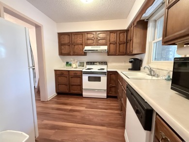 Discover lakeside living in this charming 2-bedroom, 1.5-bath on DeSoto Golf Course in Arkansas - for sale on GolfHomes.com, golf home, golf lot