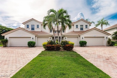 Discover this stunning first-floor coach home offering on Verandah Golf Course and Club in Florida - for sale on GolfHomes.com, golf home, golf lot