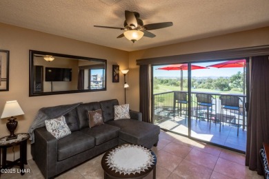 Desirable View Condo at Queensbay! This stunning lake-view condo on London Bridge Golf Course in Arizona - for sale on GolfHomes.com, golf home, golf lot