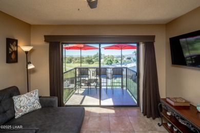 Desirable View Condo at Queensbay! This stunning lake-view condo on London Bridge Golf Course in Arizona - for sale on GolfHomes.com, golf home, golf lot