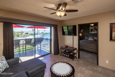Desirable View Condo at Queensbay! This stunning lake-view condo on London Bridge Golf Course in Arizona - for sale on GolfHomes.com, golf home, golf lot