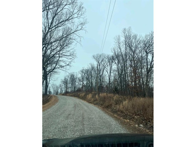 Buildable lot situated near the end of a quiet, dead-end street on Bella Vista - Metfield Golf Complex and Country Club in Arkansas - for sale on GolfHomes.com, golf home, golf lot