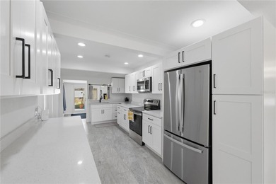 THIS IS THE ONE! Located in one of the most sought-after on Mangrove Bay Golf Course in Florida - for sale on GolfHomes.com, golf home, golf lot