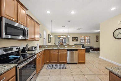 Welcome to your dream vacation home in the renowned on The Oasis Club at Champions Gate in Florida - for sale on GolfHomes.com, golf home, golf lot