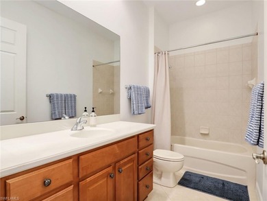 Discover an exceptional three-bedroom, three-bathroom on Lely Resort Golf and Country Club in Florida - for sale on GolfHomes.com, golf home, golf lot