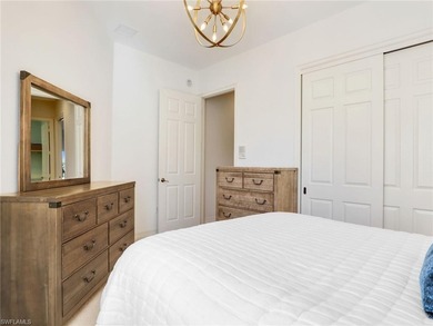 Discover an exceptional three-bedroom, three-bathroom on Lely Resort Golf and Country Club in Florida - for sale on GolfHomes.com, golf home, golf lot