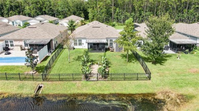 LAKE FRONT 4 bed/2 bath home in Grand Reserve! The open floor on Grand Reserve Golf Course in Florida - for sale on GolfHomes.com, golf home, golf lot