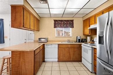 Charming golf course home located on the 15th hole of Valle on Valle Vista Golf Course in Arizona - for sale on GolfHomes.com, golf home, golf lot