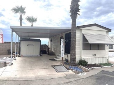 Mountain Views, Corner Lot, New Roof & Carport, Golf Cart on Roadhaven Golf Course in Arizona - for sale on GolfHomes.com, golf home, golf lot