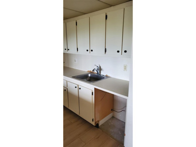 PRICED TO SELL HANDYMAN SPECIAL! 1 BED, 1 BATH PENTHOUSE CONDO on Wynmoor Golf Course in Florida - for sale on GolfHomes.com, golf home, golf lot