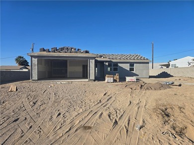 Brand new construction by Castro Construction in Fort Mohave, AZ on Los Lagos Golf Club in Arizona - for sale on GolfHomes.com, golf home, golf lot