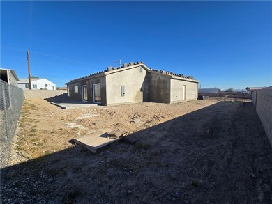 Brand new construction by Castro Construction in Fort Mohave, AZ on Los Lagos Golf Club in Arizona - for sale on GolfHomes.com, golf home, golf lot