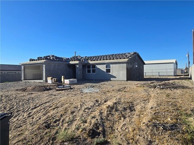 Brand new construction by Castro Construction in Fort Mohave, AZ on Los Lagos Golf Club in Arizona - for sale on GolfHomes.com, golf home, golf lot