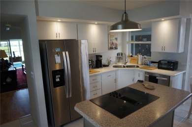 Welcome to this inviting residence in the highly sought-after on Plantation Golf and Country Club in Florida - for sale on GolfHomes.com, golf home, golf lot