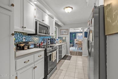 This is your chance to own a home with breathtaking views of on The Country Club of the Crystal Coast in North Carolina - for sale on GolfHomes.com, golf home, golf lot