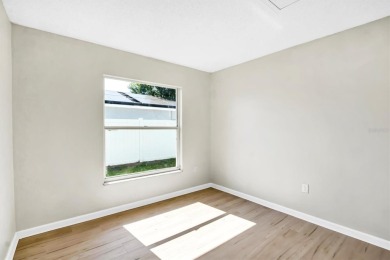 Beautifully remodeled home in desirable Poinciana Villages. This on Stonegate Golf Club in Florida - for sale on GolfHomes.com, golf home, golf lot