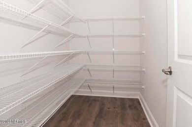 Welcome to your stunning ranch-style home in the established on Harbour Point Golf Club in North Carolina - for sale on GolfHomes.com, golf home, golf lot