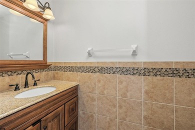 One or more photo(s) has been virtually staged. Pool Home with on The Eagles Golf Course and Club in Florida - for sale on GolfHomes.com, golf home, golf lot