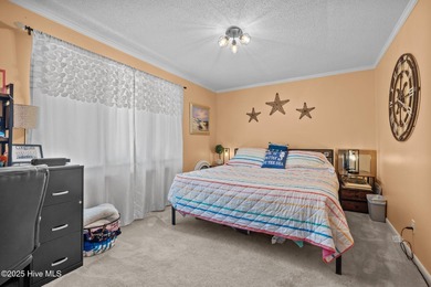 This is your chance to own a home with breathtaking views of on The Country Club of the Crystal Coast in North Carolina - for sale on GolfHomes.com, golf home, golf lot