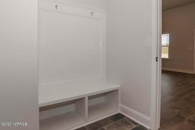 Welcome to your stunning ranch-style home in the established on Harbour Point Golf Club in North Carolina - for sale on GolfHomes.com, golf home, golf lot