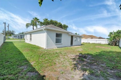 Beautifully remodeled home in desirable Poinciana Villages. This on Stonegate Golf Club in Florida - for sale on GolfHomes.com, golf home, golf lot