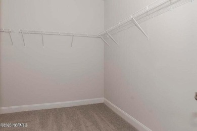 Welcome to your stunning ranch-style home in the established on Harbour Point Golf Club in North Carolina - for sale on GolfHomes.com, golf home, golf lot