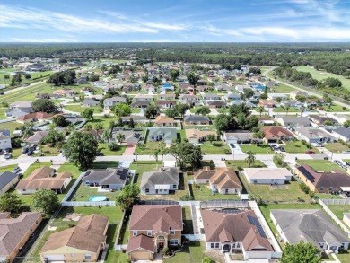 Beautifully remodeled home in desirable Poinciana Villages. This on Stonegate Golf Club in Florida - for sale on GolfHomes.com, golf home, golf lot