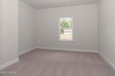 Welcome to your stunning ranch-style home in the established on Harbour Point Golf Club in North Carolina - for sale on GolfHomes.com, golf home, golf lot