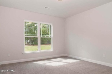 Welcome to your stunning ranch-style home in the established on Harbour Point Golf Club in North Carolina - for sale on GolfHomes.com, golf home, golf lot