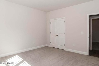 Welcome to your stunning ranch-style home in the established on Harbour Point Golf Club in North Carolina - for sale on GolfHomes.com, golf home, golf lot