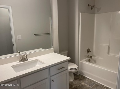 Welcome to your stunning ranch-style home in the established on Harbour Point Golf Club in North Carolina - for sale on GolfHomes.com, golf home, golf lot