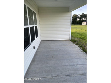 Welcome to your stunning ranch-style home in the established on Harbour Point Golf Club in North Carolina - for sale on GolfHomes.com, golf home, golf lot