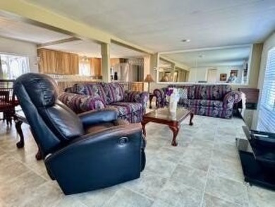 Well maintained manufactured home in active  age 55+ community on Cypress Creek Country Club - Boynton Beach in Florida - for sale on GolfHomes.com, golf home, golf lot